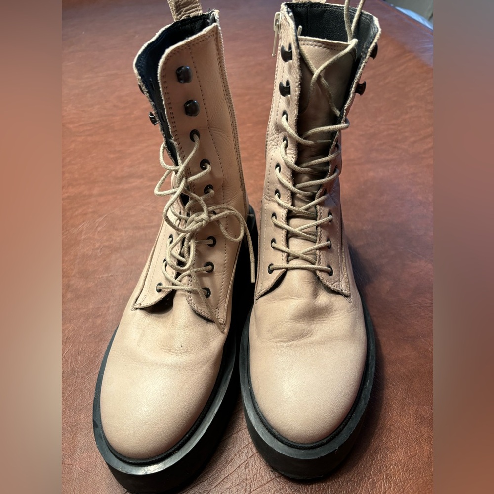 Beige leather high sole boots.